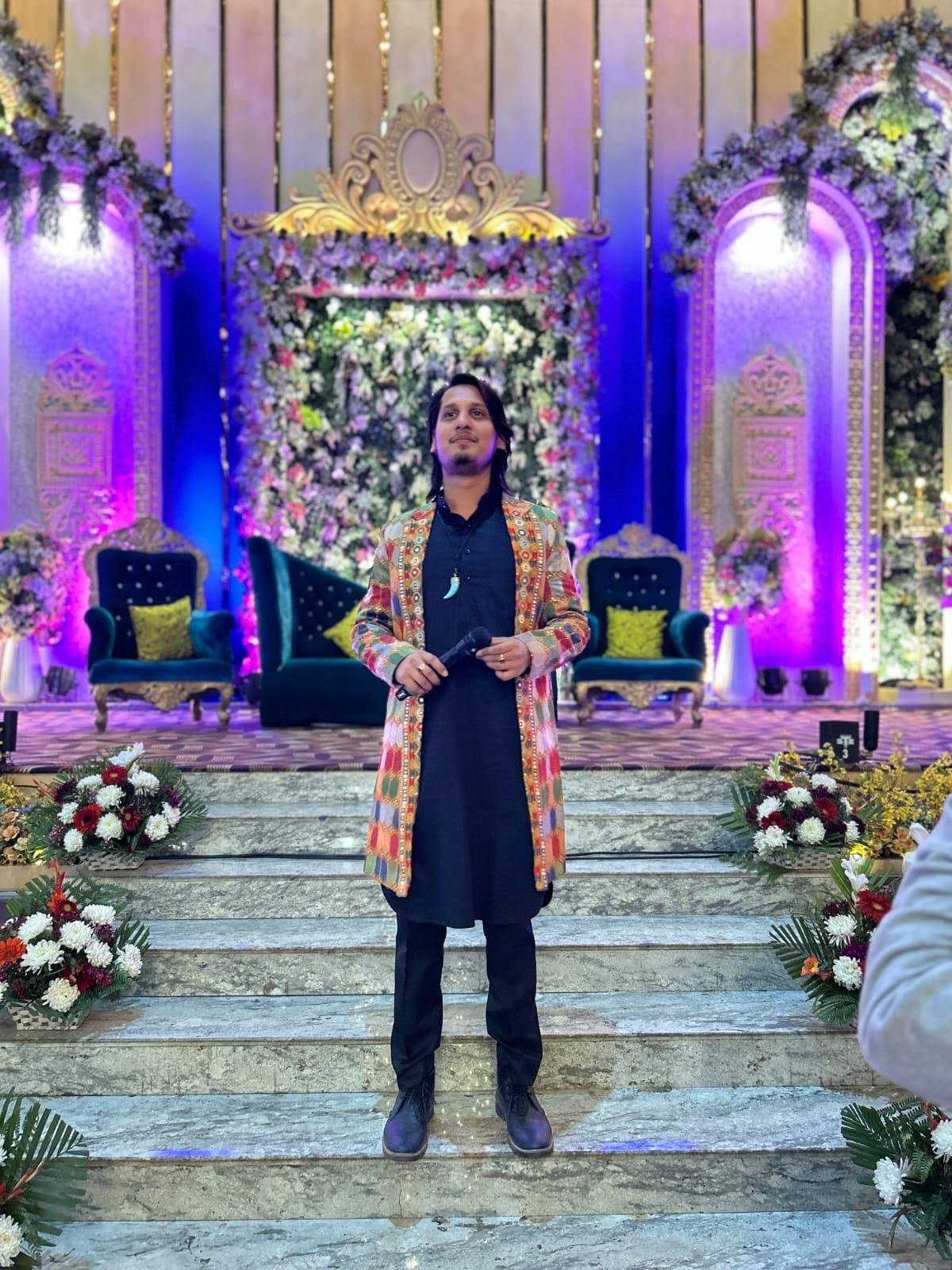 Anmoll hosting at a decorated venue